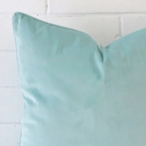 Zoomed in visual of velvet square cushion cover in duck egg.