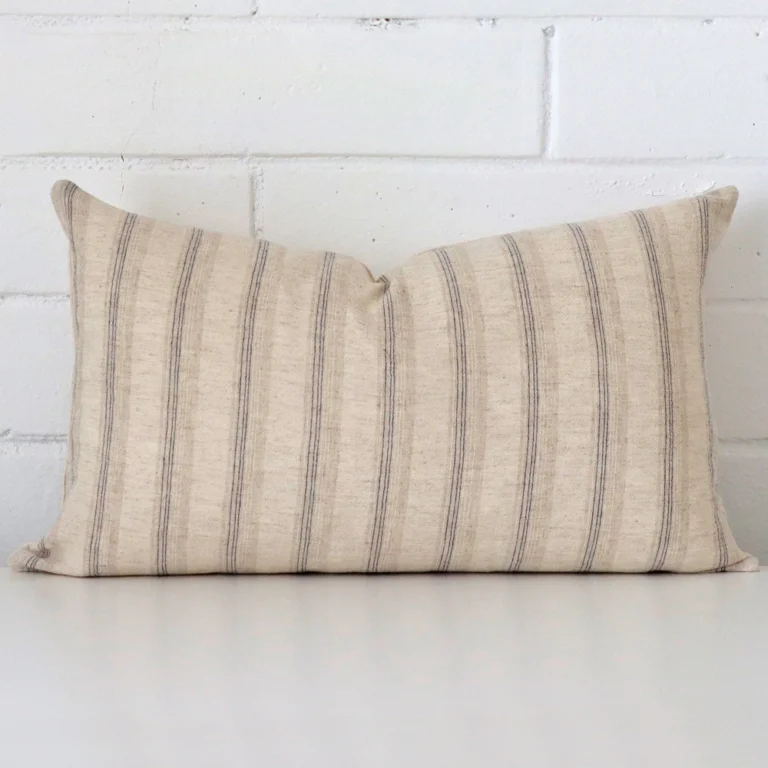 Striking rectangle cushion cover featuring a striped style on quality designer fabric.